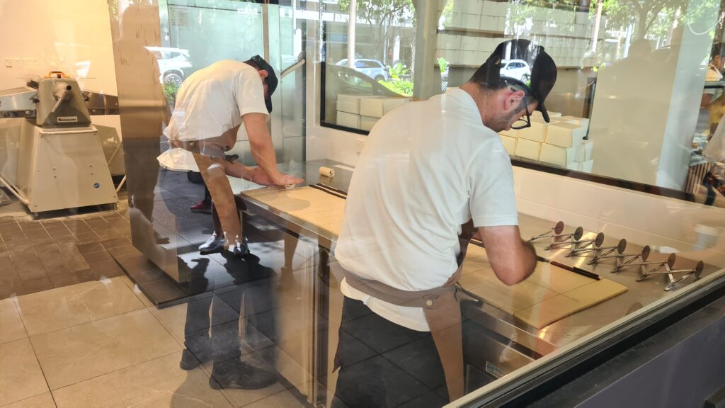 C’est Du Gâteau pastry chefs prepare chocolate croissants