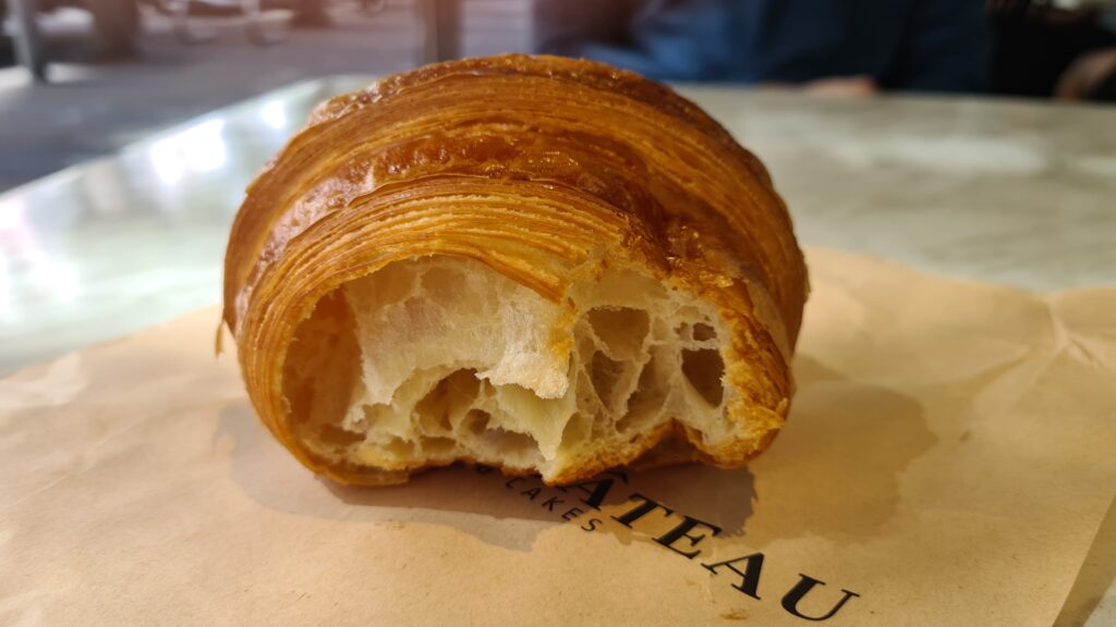 A cross-section of a croissant purchased from C'est Du Gâteau