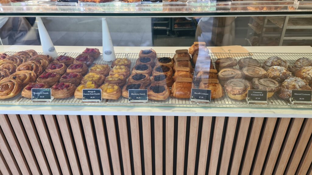 Display counter cakes for sale at Cest Du Gateau