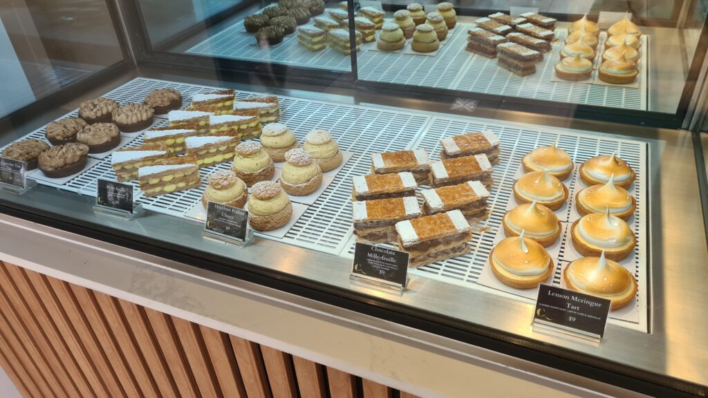 Display counter cakes for sale at Cest Du Gateau